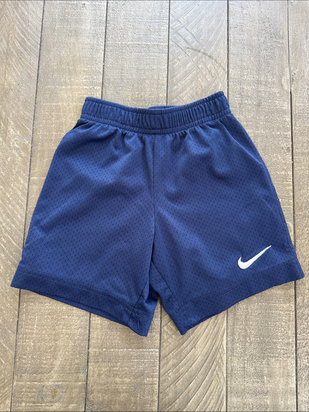 Nike Navy Blue Mesh Athletic Shorts with White Swoosh